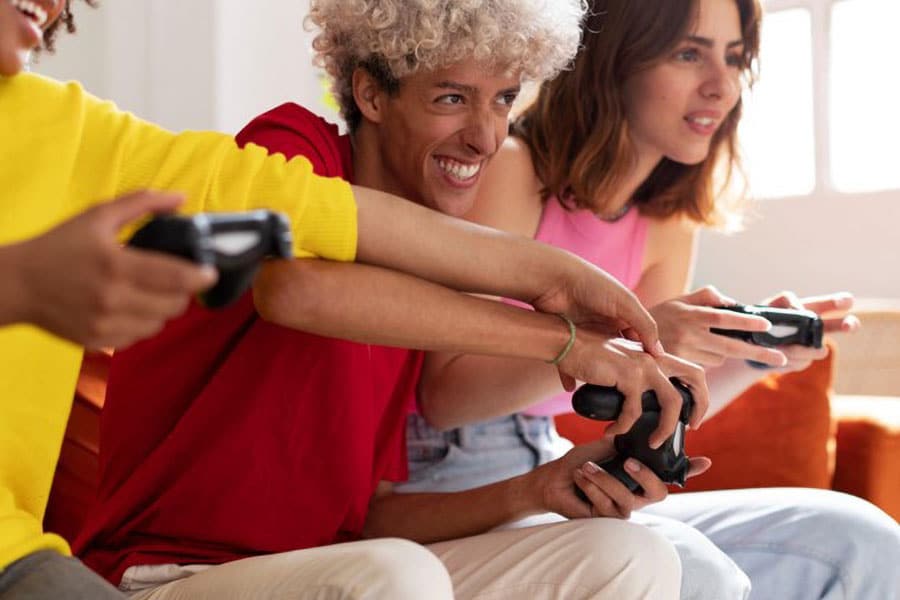 Picture of a Family Playing games on console. It's Crucial to know how to control game time.