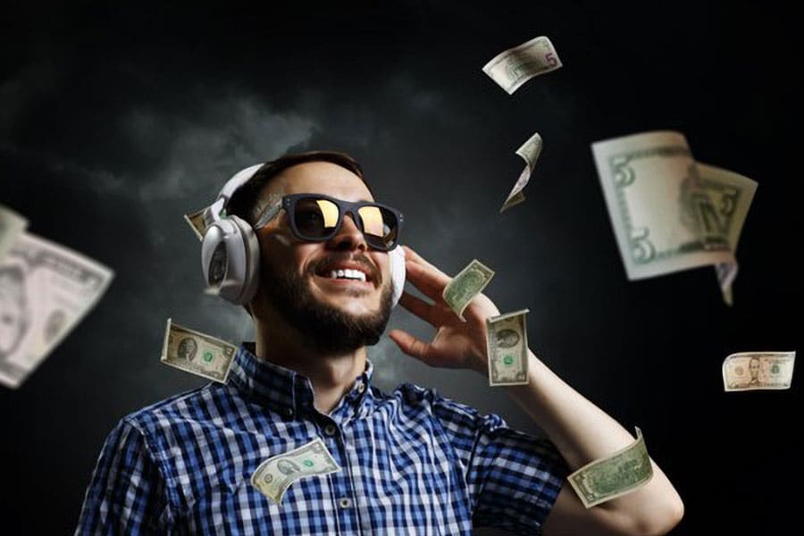 Picture of a Streamer Feeling he’s Getting Rich by Streaming games. It’s beneficial for you to learn how to make money streaming games on twitch.