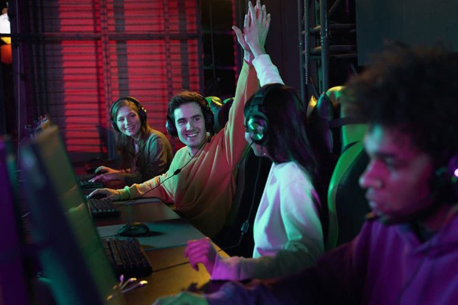 an esports team competing and working as a group is a part of professional gamer job description