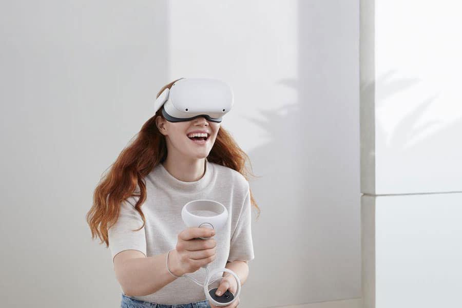 Picture of Gamer with Oculus Quest 2, best gaming console for kids.