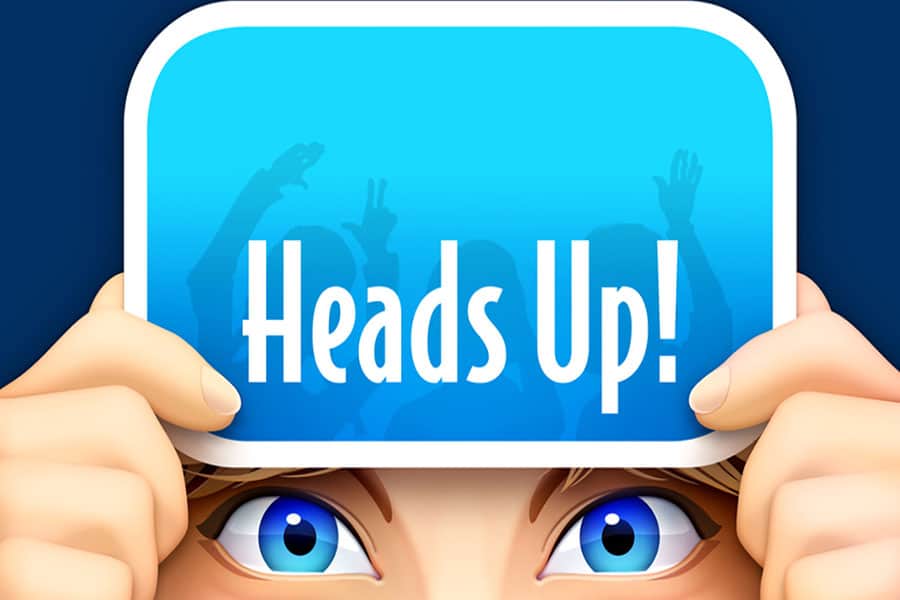 “Heads Up! game screen showing a word on a player’s forehead.”