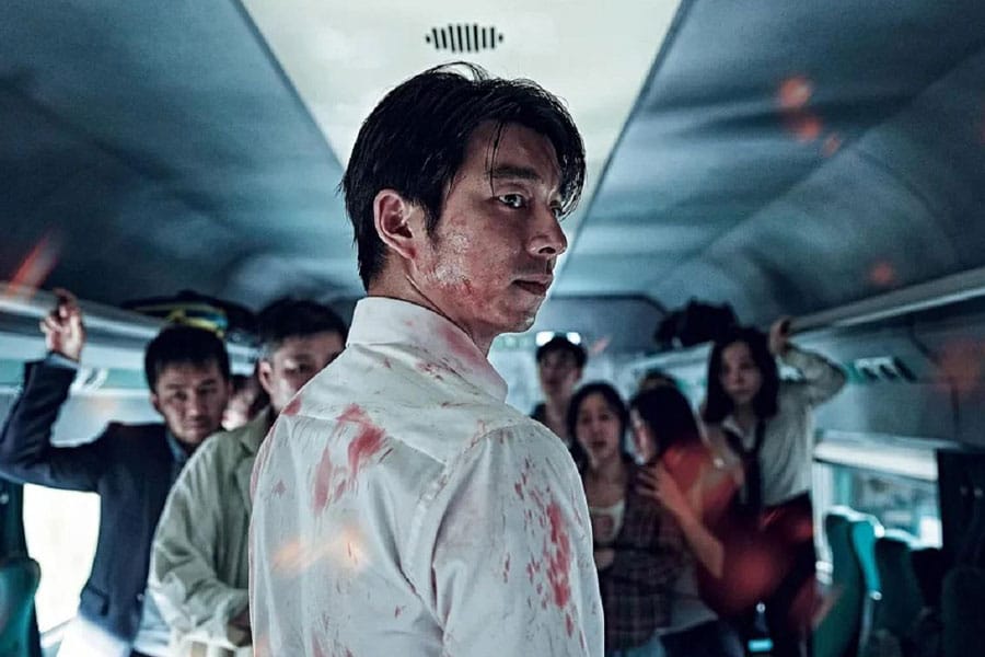 a picture of Train to Busan with its main characters, one of Korean movies for gamers.