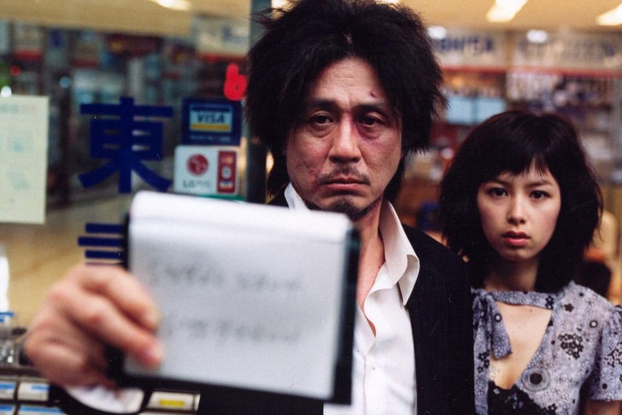 a picture of Oldboy with its main characters, one of Korean movies for gamers.