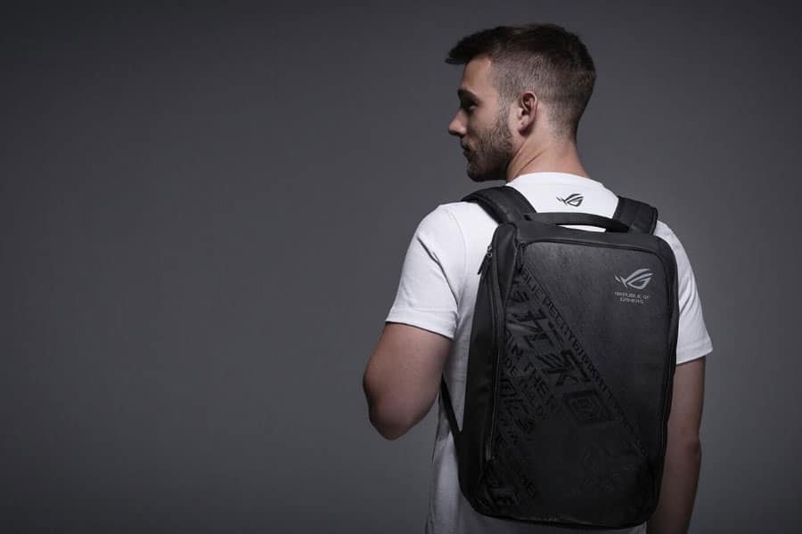 Picture of a gamer with Gaming Backpack, a wedding gift for video gamer.