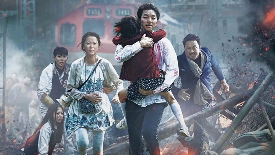 Poster of the movie "Train to Busan" showing a crowded train station.