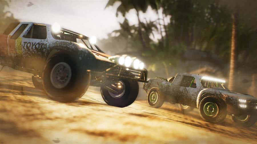 A picture of the game, featuring trucks racing.