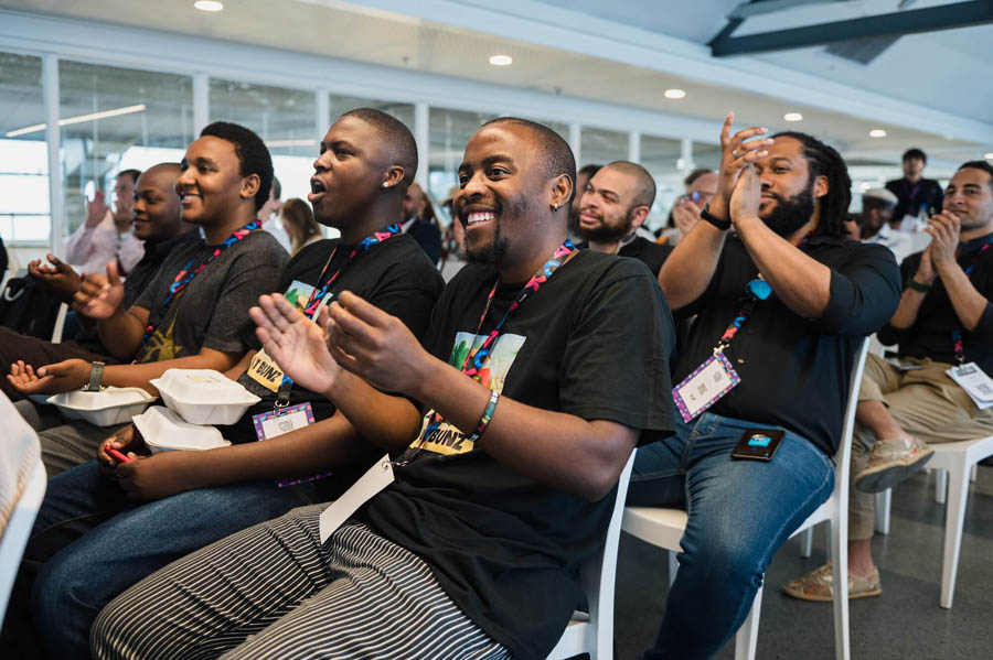 bunch of black people in conference of Africa Games Week 2024.