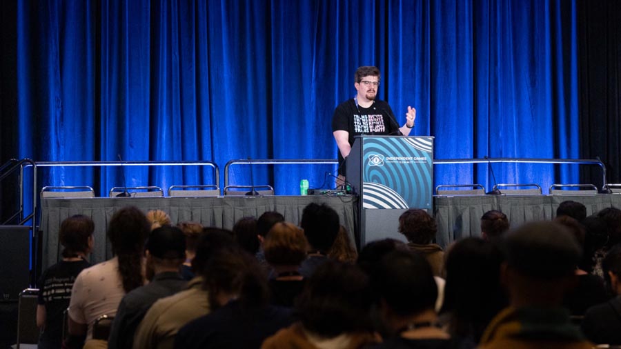 conference of a male person about GDC 2025 in a hall.