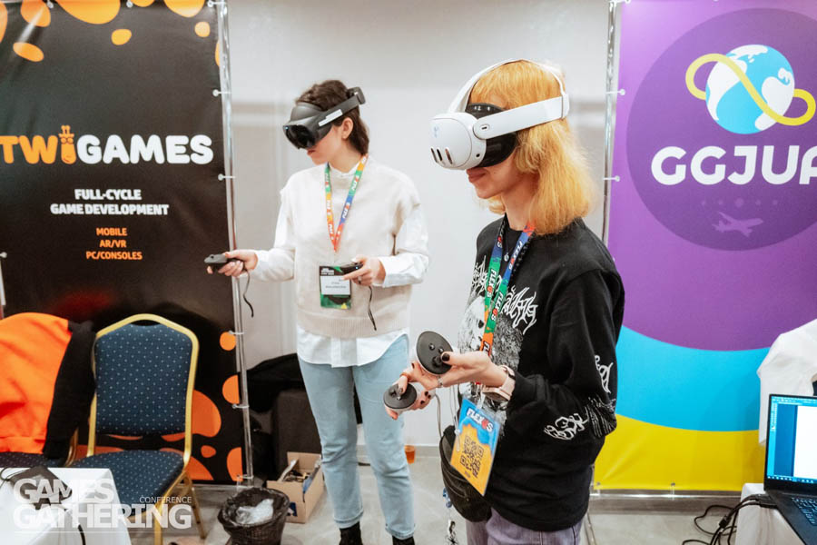 two women playing virtual reality in Games Gathering Kyiv 2025