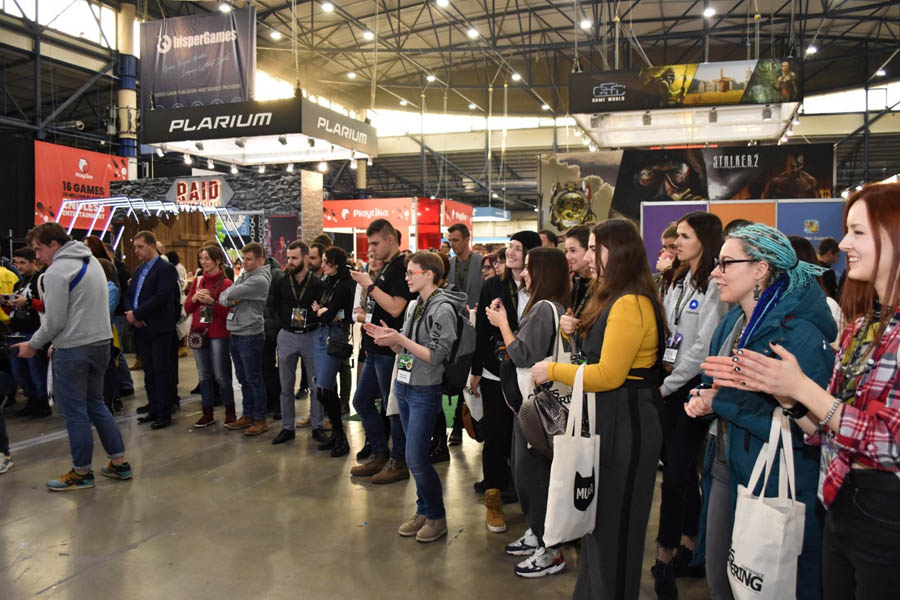 a group of people in a hall in Games Gathering Kyiv 2025